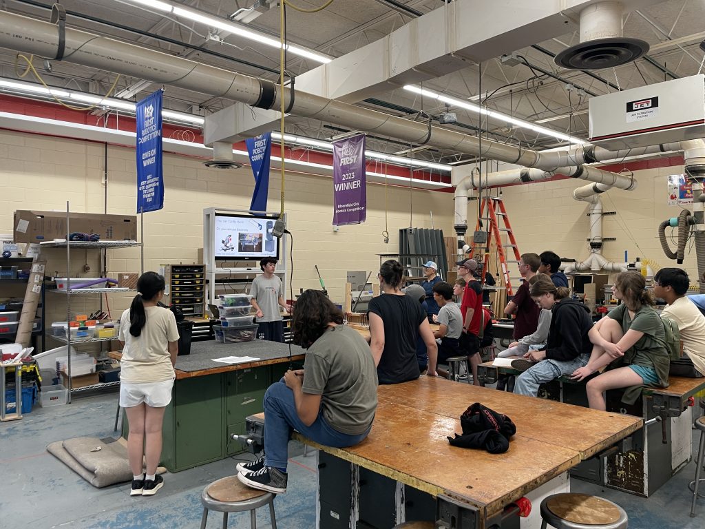 The Fabrication Subteam's Student Lead presenting to students